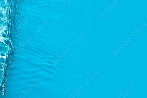Top view of blue water Water waves in sunlight with copy space