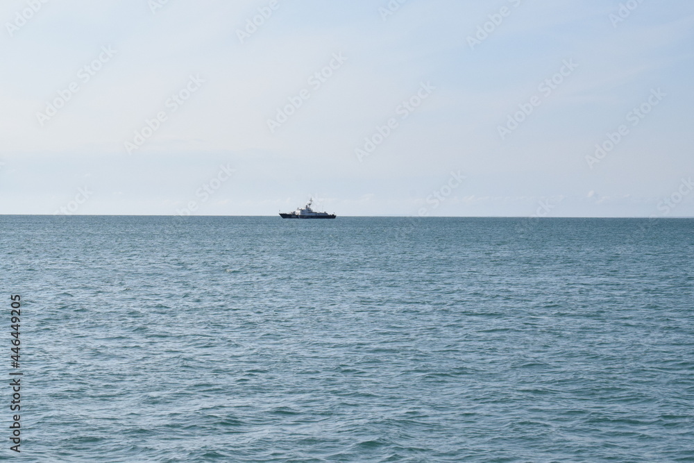 The ship is on the horizon. Black Sea. Beautiful seascape.