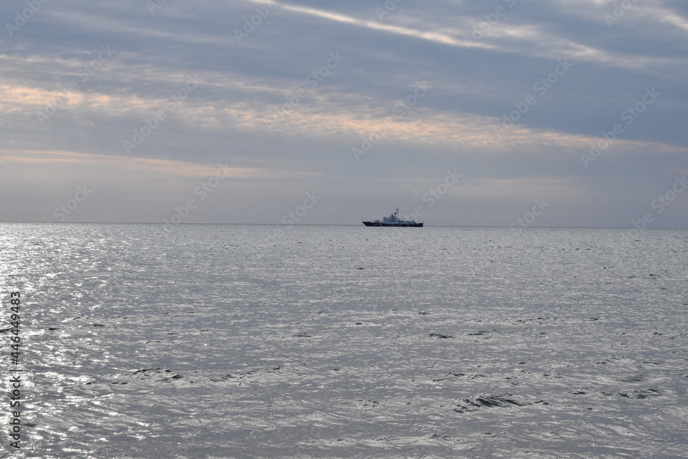 The ship is on the horizon. Black Sea. Beautiful seascape.