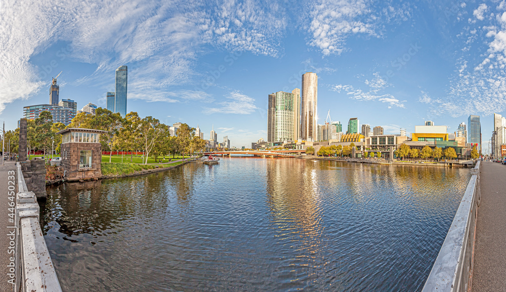 Panoramic view of Melbourne skyline taken from a bridge over the Yarra river