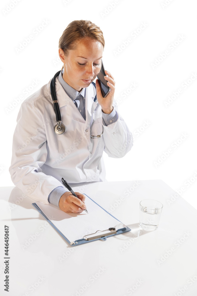 Portrait of doctor, therapeutic or medical advisor at work. Phone consultation, advice. Concept of healthcare, care and medicine. Portrait of doctor, therapeutic or medical advisor at work. Phone consultation, advice. Concept of healthcare, care and medicine.