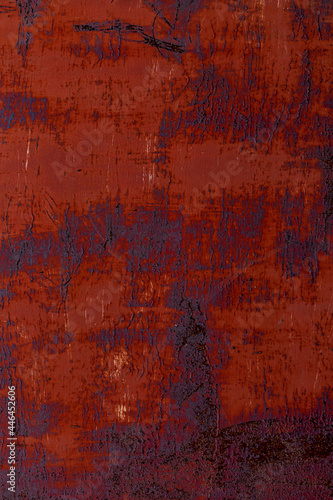 Rusty red painted metal background.