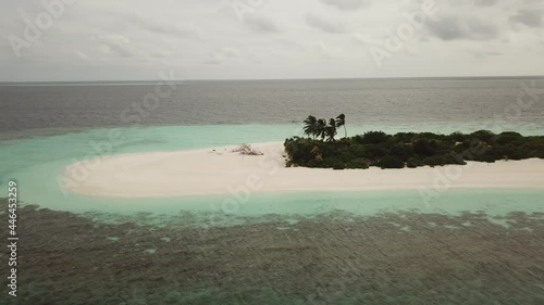 Aerial  Drone Tropical Island on the Maldives with white beaches and azure blue water photo