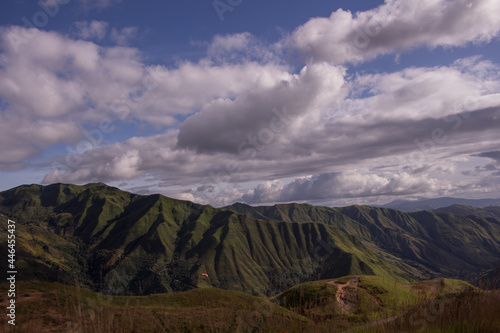 mountains valley and cloudy sky