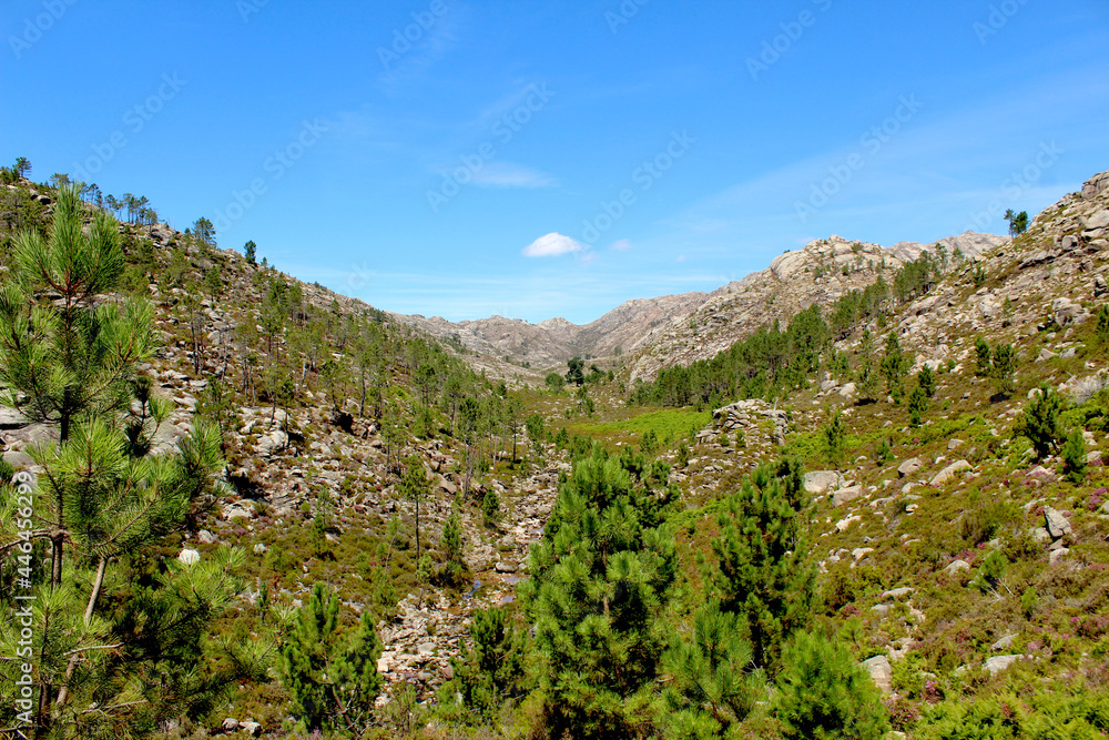 The rocky landscape and mountainous relief of Portuguese-Spanish border forest in Peneda Geres, northwest Iberia