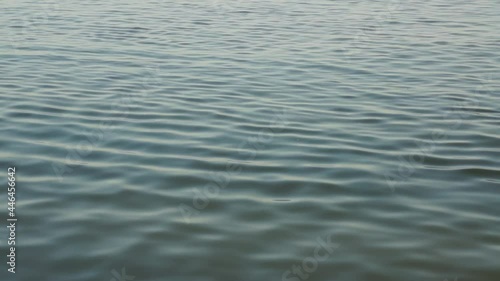 Calm water surface on the beach