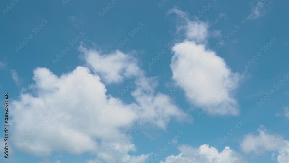 Beauty atmospheric phenomena, white clouds float low through the blue sunny sky. Beauty atmospheric phenomena, white clouds float low through the blue sunny sky.