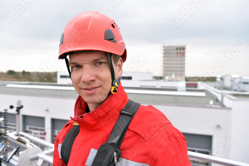 training in altitude rescue at the fire brigade - emergency operation with a crane trolley and abseiling photo