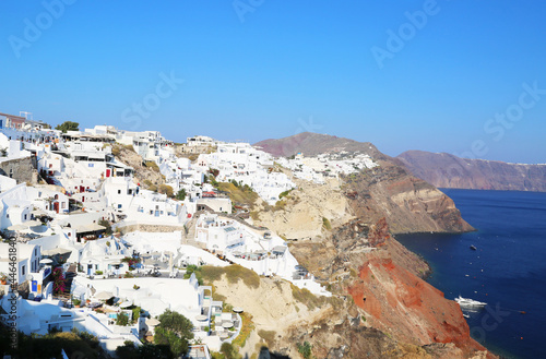 Beaitufil young woman girl traveller in long dress smiling enjoying luxury life in Santorini Greece.