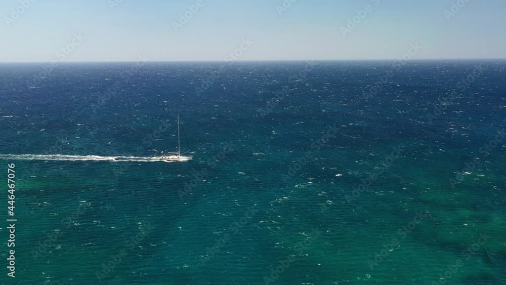 Greece. View of the yacht and the blue sea water. Rest and travel. Summer landscape from the air. Greece. View of the yacht and the blue sea water. Rest and travel. Summer landscape from the air.