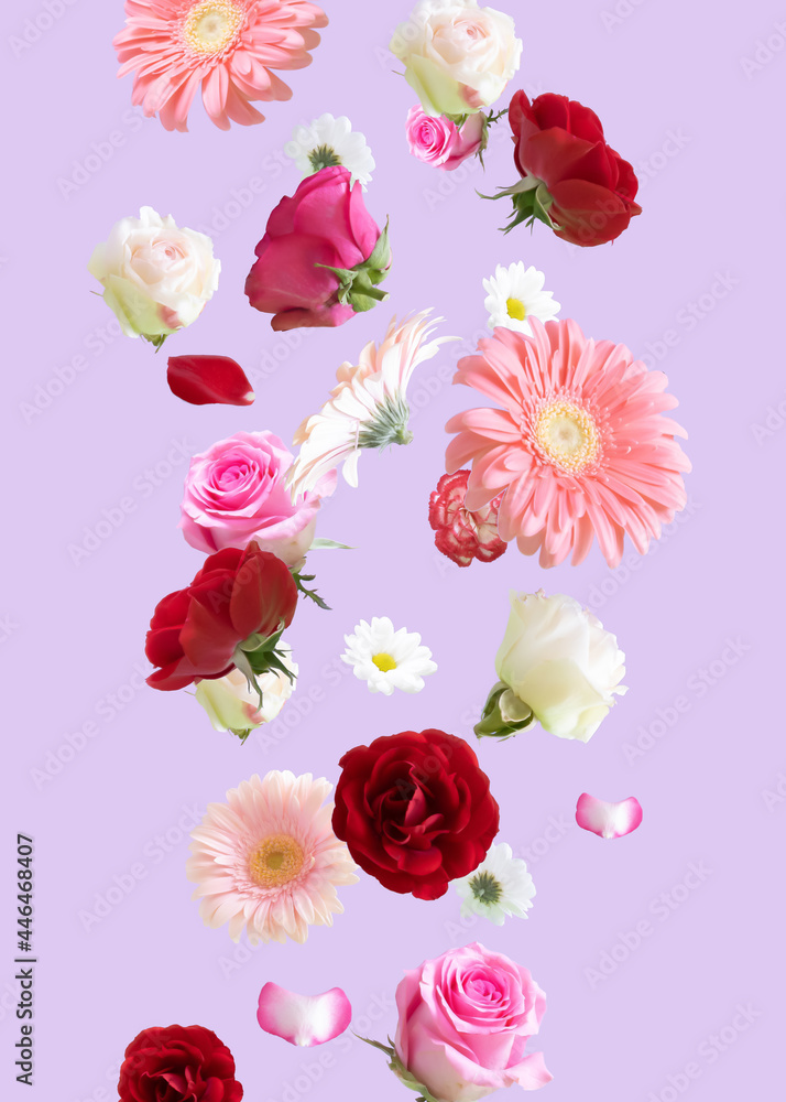 Minimal nature concept. Creative arrangement with various flowers against pastel purple background. Minimal nature concept. Creative arrangement with various flowers against pastel purple background.