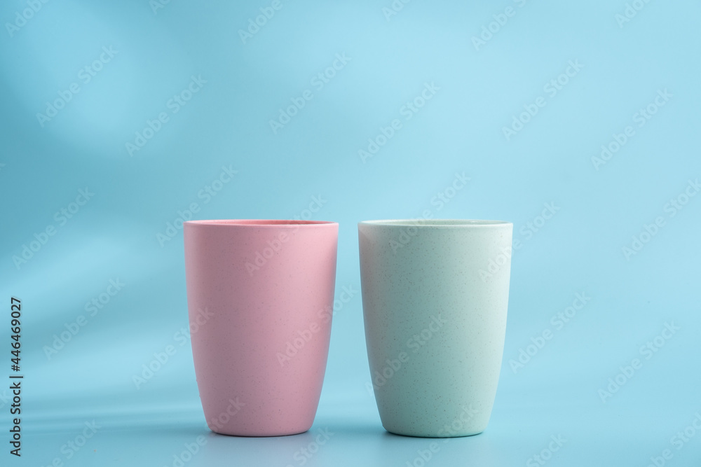 Colorful plastic cups on a white background Colorful plastic cups on a white background