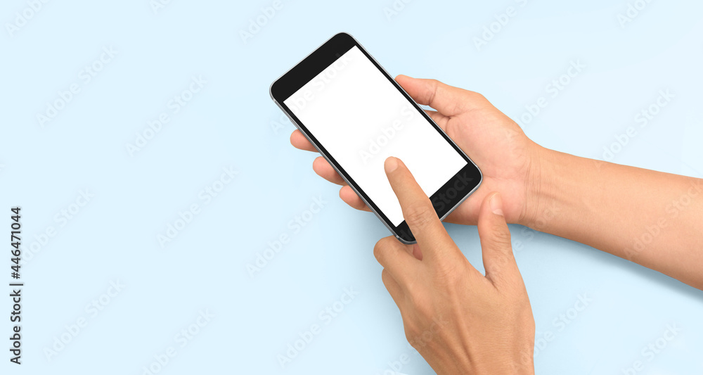 Hand holding smartphone device touching screen Hand holding smartphone device touching screen