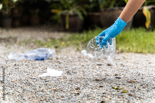 Volunteer woman keep plastic bottle garbage for recycling concept reuse Ecology and environment photo