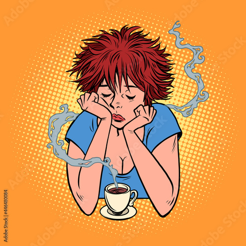 A sad woman over a cup of coffee. Coffee shop and restaurant. Hot drink