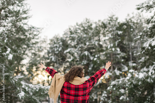 Happy Girl In Red Jachet The Snow Forest. Cold Winter. Cup of tea. photo