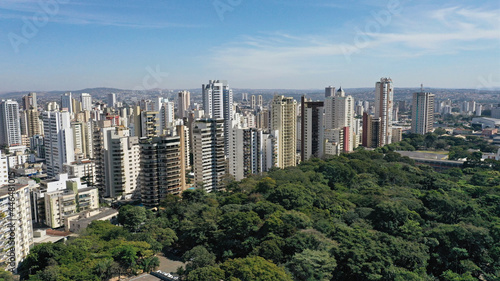 Aerial view of a beautiful park with tropical nature in Goiania surrounded by residential buildings. Goiania, Goias, Brazil 