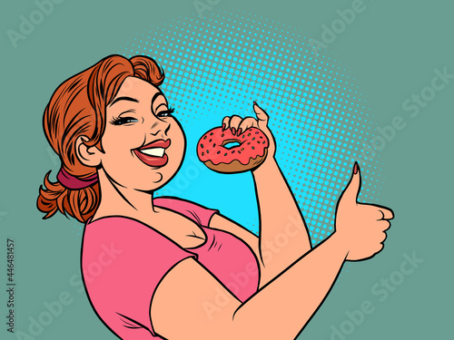 a woman eats a donut. Delicious confectionery food. Like gesture