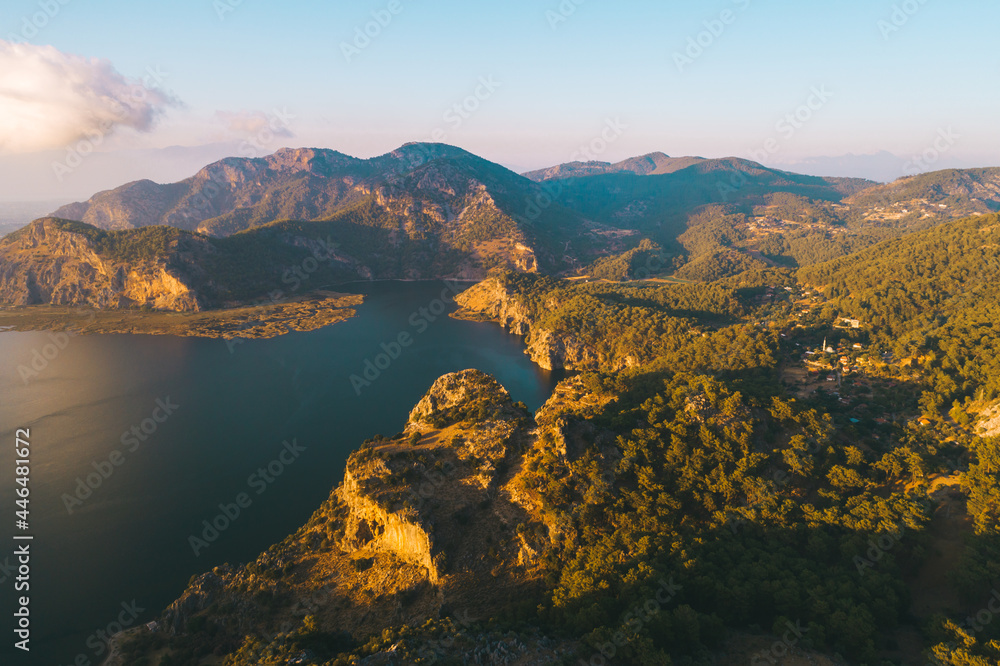 Scenic aerial panoramic view from  Iztuzu beach and the Dalyan river Delta as well as lake Sulungur at sunset time. Majestic summer landscape. Explore natural wonders of Turkey