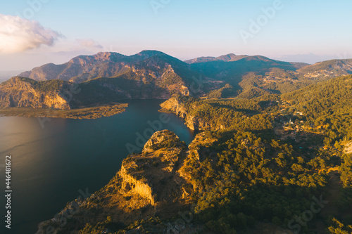 Scenic aerial panoramic view from Iztuzu beach and the Dalyan river Delta as well as lake Sulungur at sunset time. Majestic summer landscape. Explore natural wonders of Turkey