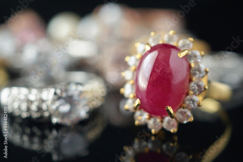 big red ruby ring with jewelry background