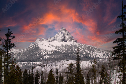 The snow covered mountain Three Fingered Jack at sunset in the cascade range of central Oregon, in the Willamette National Forest near Santiam, Oregon.