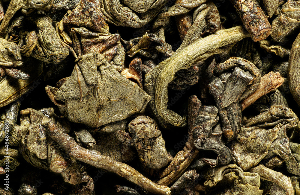 Green tea, dry leaves under 1.5x magnification microscope - image width 23mm Green tea, dry leaves under 1.5x magnification microscope - image width 23mm