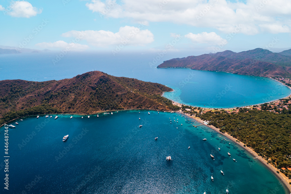 Mediterranean coast of Datca peninsula. The coastline of Datca runs and consists of big and small, deep and crystal blue coves. Drone view.  Mugla. Turkey
