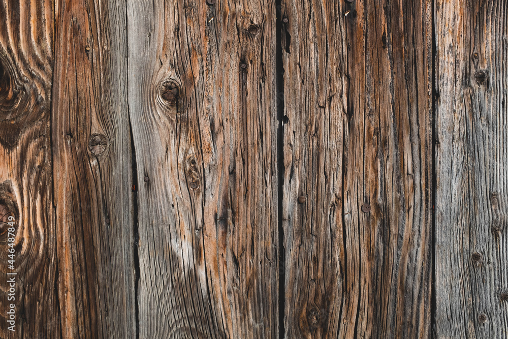 Vertical dark wooden planks, pine wood, wood texture surface, vintage background with place for text, wood processed timber, horizontal close-up photography Vertical dark wooden planks, pine wood, wood texture surface, vintage background with place for text, wood processed timber, horizontal close-up photography