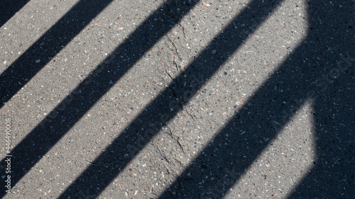 asphalt with vertical shadows © Quiles