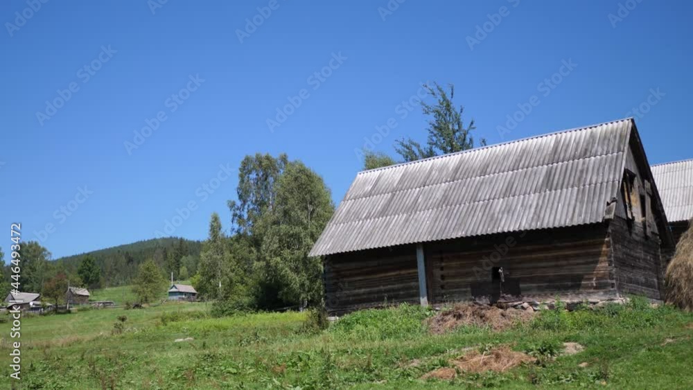 rustic timbered house Ukraine Karpaty mountain village against the backdrop of the deciduous and coniferous forests and wildlife rustic timbered house Ukraine Karpaty mountain village against the backdrop of the deciduous and coniferous forests and wildlife