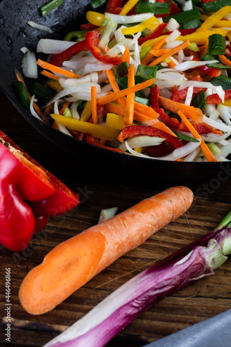 Sauteed colorful vegetables, rustic pan. bell pepper, carrot, onion. fajitas