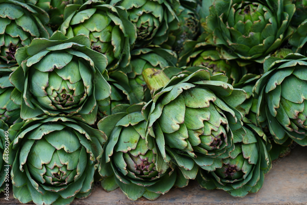 Green and purple artichokes at a French farmers market Green and purple artichokes at a French farmers market