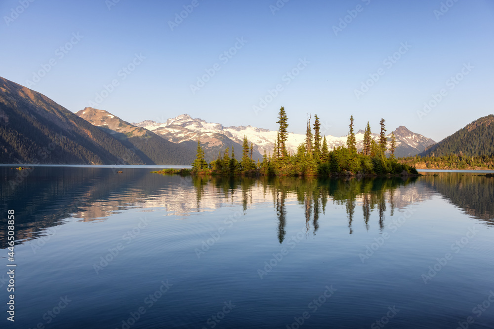 View of Canadian Nature Landscape with rocky islands and mountains in the background. Garibaldi Lake, Near Whistler and Squamish, North of Vancouver, British Columbia, Canada. Sunny Summer
