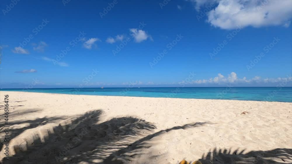 Video in the real-time panoramic view of a deserted tropical beach, and the Caribbean Sea on the horizon. Concept travel vacations Video in the real-time panoramic view of a deserted tropical beach, and the Caribbean Sea on the horizon. Concept travel vacations