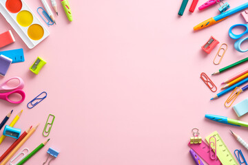Back to school concept. Frame made of school stationery on pink background , Flat lay, top view, copy space