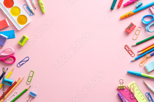 Back to school concept. Frame made of school stationery on pink background , Flat lay, top view, copy space