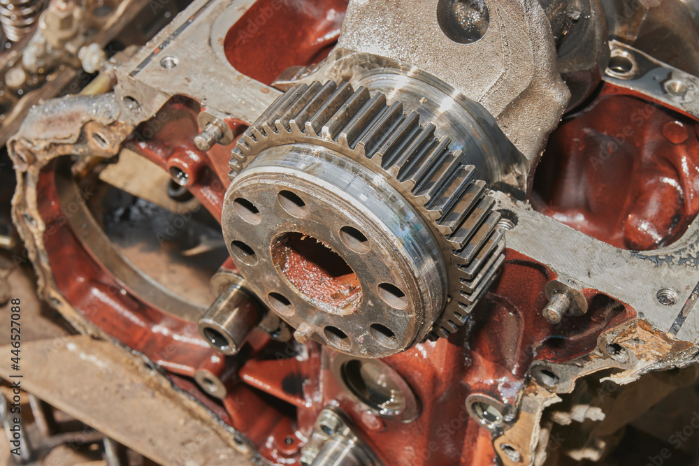 High Angle View of Crankshaft Gear in Front of Car Engine or Auto Engine