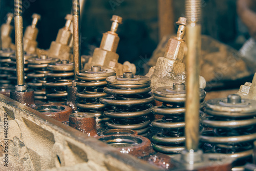 Exhaust Valve and Intake Valve and Fuel Injector on Cylinder Head of Truck Engine in Vintage Tone