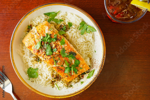 Broiled salmon over rice