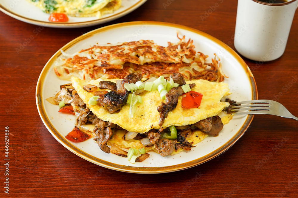 Omelette with hashed brown potatoes Omelette with hashed brown potatoes