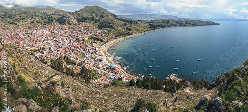 Aerial panoramic view of Copacabana town. Titicaca lake and mountains. Cityscape. La Paz Department, Bolivia