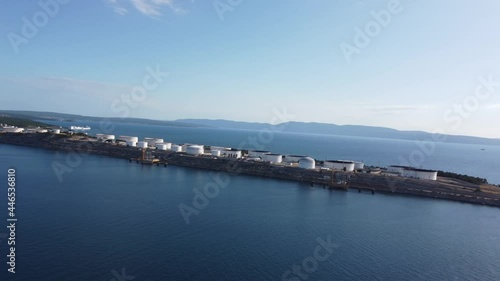 Wallpaper Mural Drone flying alongside an industrial island in the mediterranean against the wind sideways over Krk Torontodigital.ca