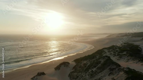 Beautiful Sun At Sunrise Shining Over Seascape And Sardinia Bay Beach In South Africa. - aerial