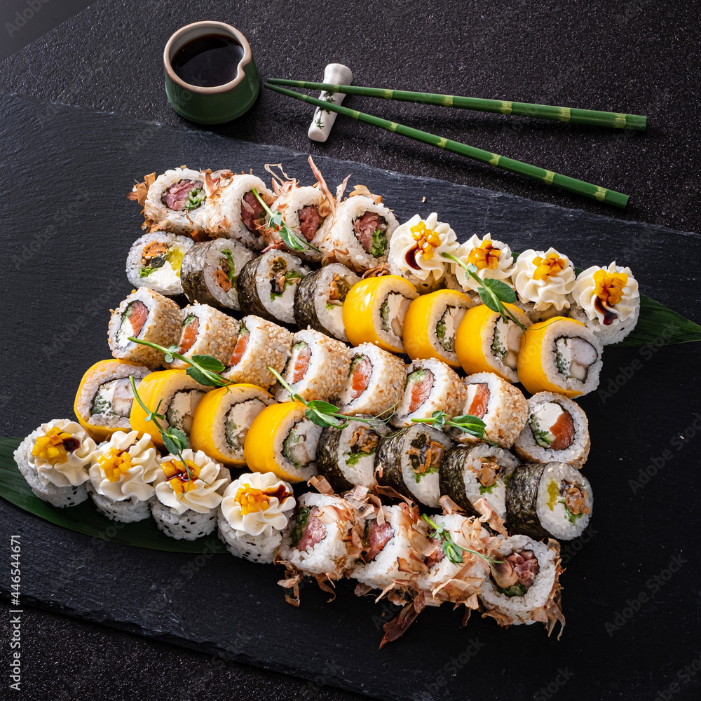 tasty sushi on the black background tasty sushi on the black background