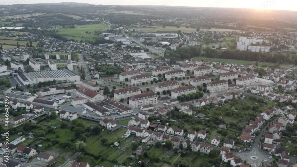 Drone Aerial shot of Montluçon in central France. Montlucon is the largest commune in the Allier department and belongs to the Auvergne-Rhône-Alpes region. A panorama of the french city at sunset. Drone Aerial shot of Montluçon in central France. Montlucon is the largest commune in the Allier department and belongs to the Auvergne-Rhône-Alpes region. A panorama of the french city at sunset.