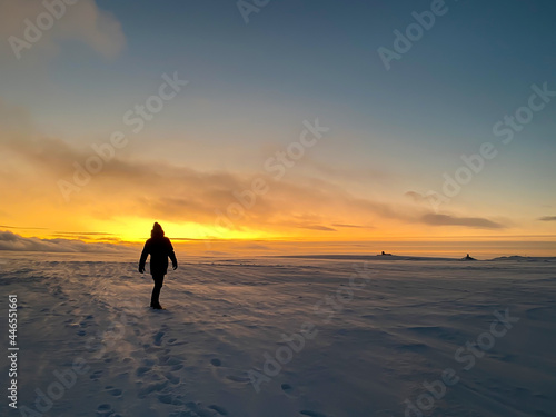 Nordkapp, Norway in January: person in the midnight sun in the most north point of Europe