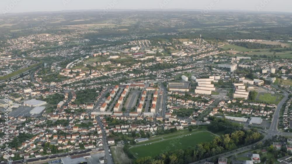 Drone Aerial shot of Montluçon in central France. Montlucon is the largest commune in the Allier department and belongs to the Auvergne-Rhône-Alpes region. A panorama of the french city at sunset. Drone Aerial shot of Montluçon in central France. Montlucon is the largest commune in the Allier department and belongs to the Auvergne-Rhône-Alpes region. A panorama of the french city at sunset.