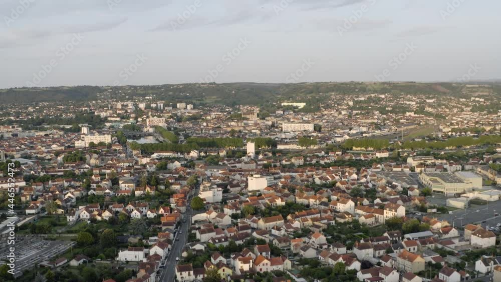 Drone Aerial shot of Montluçon in central France. Montlucon is the largest commune in the Allier department and belongs to the Auvergne-Rhône-Alpes region. A panorama of the french city at sunset. Drone Aerial shot of Montluçon in central France. Montlucon is the largest commune in the Allier department and belongs to the Auvergne-Rhône-Alpes region. A panorama of the french city at sunset.