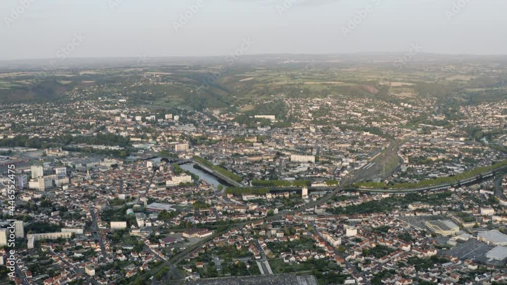 Drone Aerial shot of Montluçon in central France. Montlucon is the largest commune in the Allier department and belongs to the Auvergne-Rhône-Alpes region. A panorama of the french city at sunset. Drone Aerial shot of Montluçon in central France. Montlucon is the largest commune in the Allier department and belongs to the Auvergne-Rhône-Alpes region. A panorama of the french city at sunset.